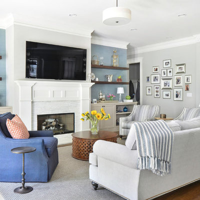 Mid-sized transitional open concept dark wood floor family room photo in Atlanta with a standard fireplace, a stone fireplace, a wall-mounted tv and multicolored walls