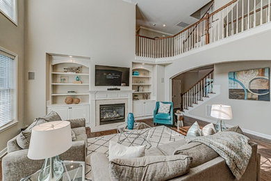Example of a transitional family room design in Charlotte