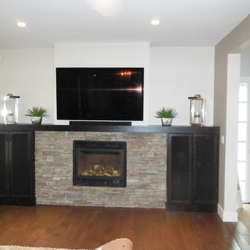 Built-in custom cabinetry, built-in media connections and a gas fireplace