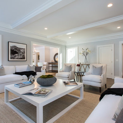 Family room - transitional dark wood floor family room idea in New York with gray walls