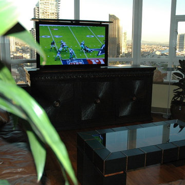 Cabinet with TV lift kit shows how view can be saved in condo tower