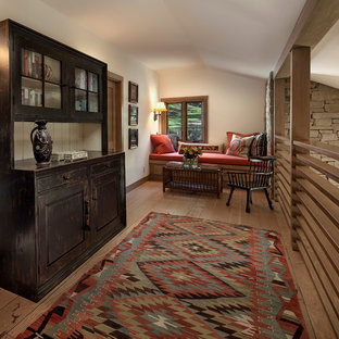 Inspiration for a rustic family room remodel in Santa Barbara with white walls