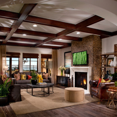 Inspiration for a mediterranean enclosed family room remodel in San Francisco with a standard fireplace
