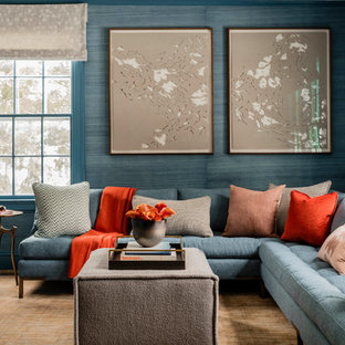 Family room library - mid-sized transitional enclosed carpeted and beige floor family room library idea in Boston with blue walls