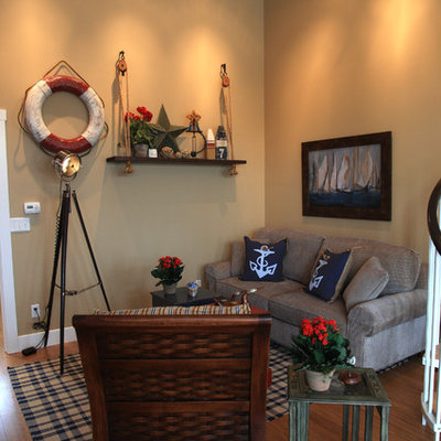 Family room - mid-sized eclectic open concept medium tone wood floor family room idea in Chicago with multicolored walls, a wall-mounted tv and no fireplace