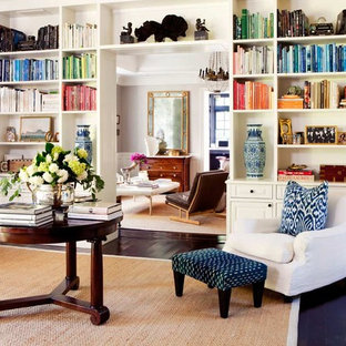 Example of a classic family room library design in San Diego
