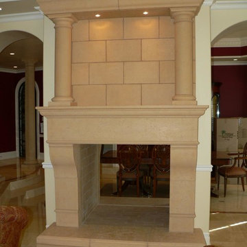 Cast stone precast mantel and hearth with Tuscan columns