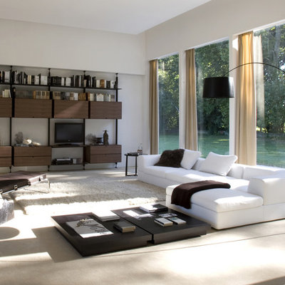 Family room - large modern family room idea in Philadelphia with white walls and no fireplace