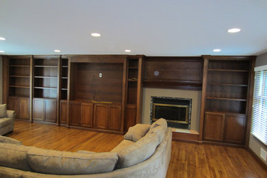 Example of a transitional family room design in New York