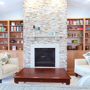 Cherry builts in in Living Room with Stacked Stone fireplace