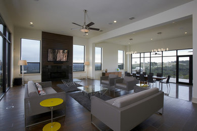 Example of a minimalist family room design in Austin