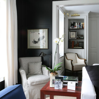 Inspiration for a victorian family room remodel in Boston with black walls