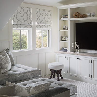 Inspiration for a small transitional family room remodel in Boston with white walls and a wall-mounted tv