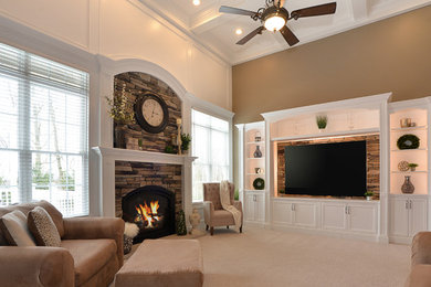 Large elegant enclosed dark wood floor and brown floor family room photo in Other with brown walls, a standard fireplace, a stone fireplace and a media wall