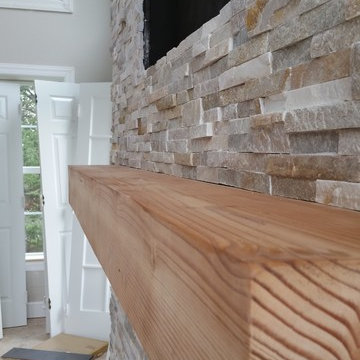 Commanding Natural Stone Fireplace 14 ft Height Wood Mantel