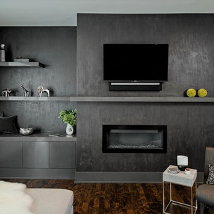 Inspiration for a mid-sized contemporary open concept dark wood floor and brown floor family room remodel in Minneapolis with a ribbon fireplace, a wall-mounted tv and gray walls