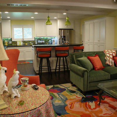 Trendy dark wood floor family room photo in Other with yellow walls