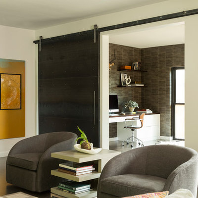 Family room - mid-sized contemporary open concept dark wood floor family room idea in Dallas with white walls, a standard fireplace and a wall-mounted tv
