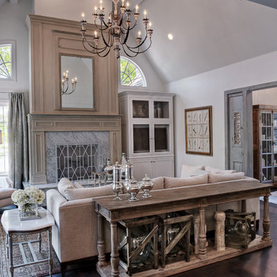 Family room - mid-sized traditional enclosed dark wood floor family room idea in Other with white walls, a standard fireplace and a concealed tv