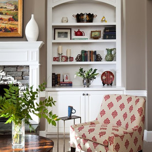 Family room - large traditional open concept carpeted family room idea in Atlanta with beige walls, a standard fireplace, a stone fireplace and a concealed tv