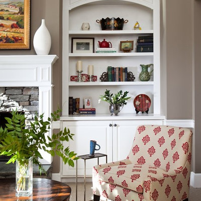 Family room - large traditional open concept carpeted family room idea in Atlanta with beige walls, a standard fireplace, a stone fireplace and a concealed tv