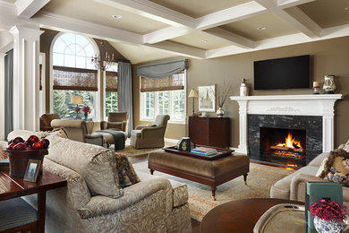 Large elegant open concept dark wood floor family room photo in Detroit with brown walls, a standard fireplace, a stone fireplace and a wall-mounted tv