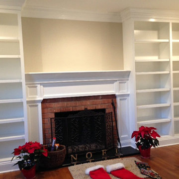 Custom built-in Bookcases with Crown Molding & Custom Fireplace Surround