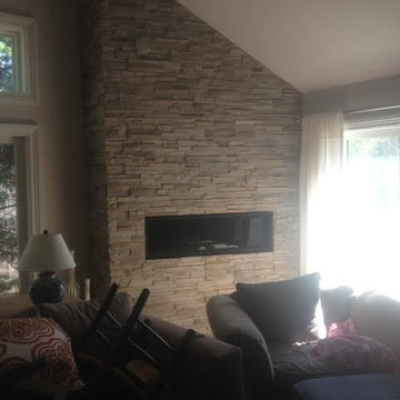 Custom Fireplace in Living Room with Stone Surround
