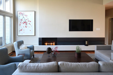 Inspiration for a mid-sized contemporary open concept dark wood floor family room remodel in DC Metro with a standard fireplace and a metal fireplace