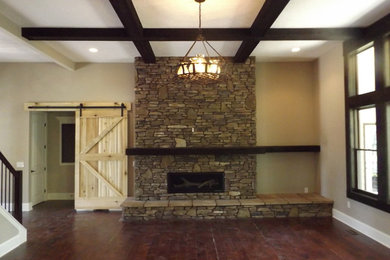Example of a mountain style family room design in Cleveland
