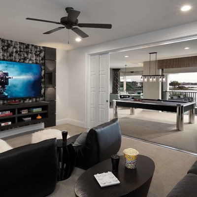 Example of a mid-sized trendy open concept carpeted game room design in Orlando with white walls, no fireplace and a wall-mounted tv