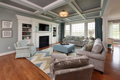 Example of a transitional family room design in DC Metro