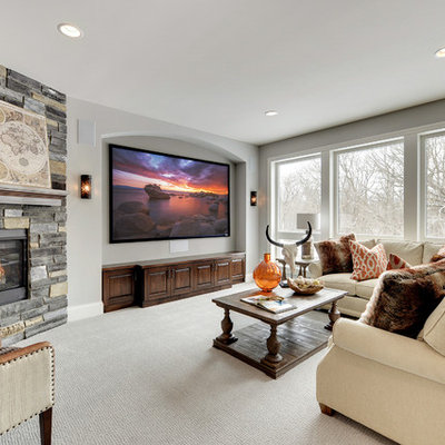 Inspiration for a timeless carpeted family room remodel in Minneapolis with gray walls, a corner fireplace and a wall-mounted tv