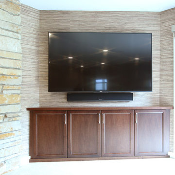 Diagonal TV with Built-In Cabinets Below