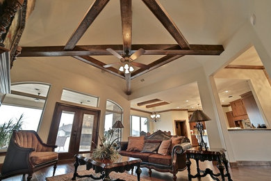 Family room - large rustic open concept family room idea in Austin