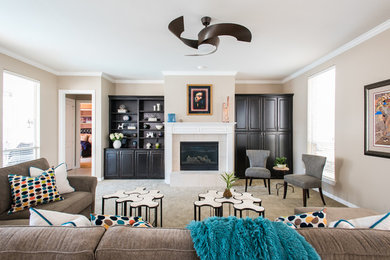 На фото: большая изолированная гостиная комната в стиле фьюжн с бежевыми стенами, ковровым покрытием, стандартным камином, фасадом камина из плитки и коричневым полом без телевизора