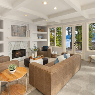 Large transitional open concept carpeted, gray floor and exposed beam family room photo in Seattle with a standard fireplace, a stone fireplace and gray walls