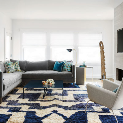 Large transitional open concept medium tone wood floor family room photo in Chicago with white walls, a ribbon fireplace and a wall-mounted tv