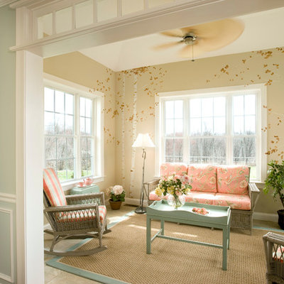 Example of a classic enclosed family room design in Boston with beige walls