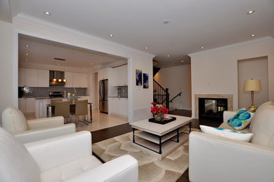 Example of a transitional family room design in Toronto