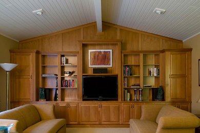 Example of a huge classic open concept carpeted and beige floor family room library design in Cleveland with green walls, no fireplace and a tv stand