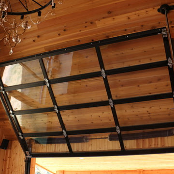 Entertainment room with full-view overhead garage door