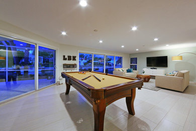 Inspiration for a beach style games room in Tampa.