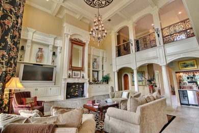 Example of a tuscan family room design in New Orleans