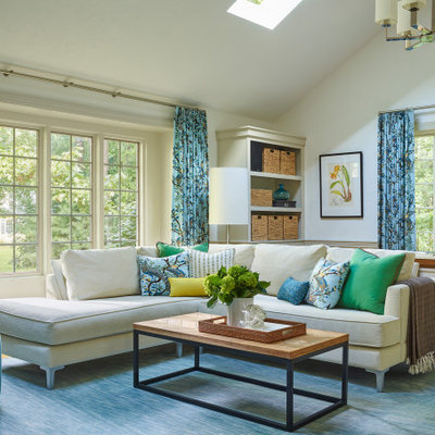 Family room - mid-sized transitional open concept medium tone wood floor, brown floor and vaulted ceiling family room idea in Boston with white walls
