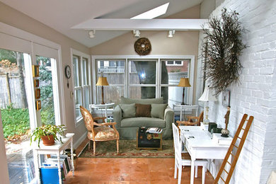 Inspiration for a large timeless loft-style ceramic tile family room remodel in Bridgeport with beige walls