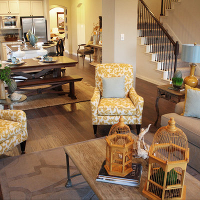 Example of a classic medium tone wood floor and gray floor family room design in Dallas with beige walls