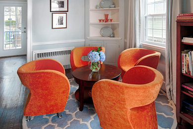 Mid-sized trendy open concept dark wood floor family room photo in Boston with blue walls and no fireplace