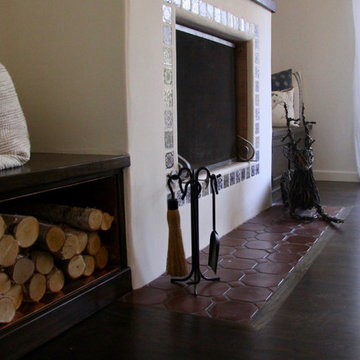 Family Room/fireplace copper lined wood storage