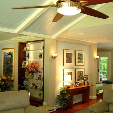 Family Room Gallery Walls with Ceiling Fan, Brazilian Cherry Wood Flooring.jpg